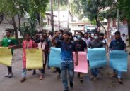 Students’ human chain demanding protection of JnU’s central playground”